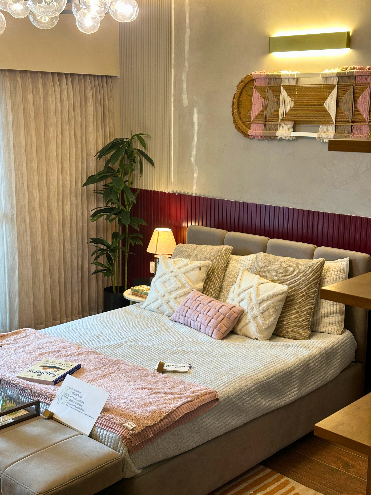 Prestige Garden Breez — bedroom with red-panel accent wall